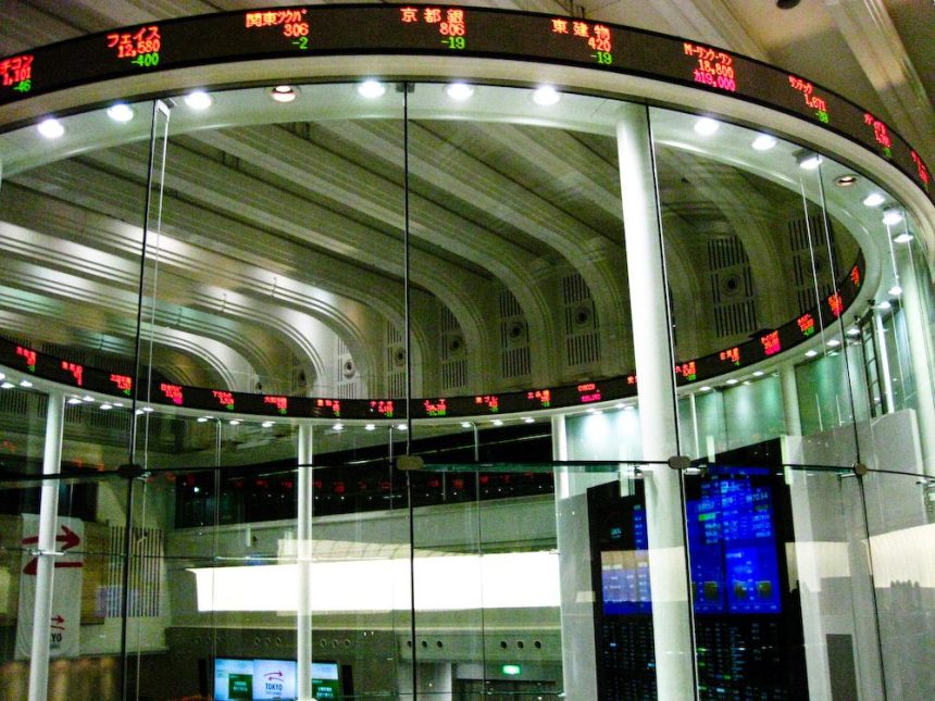 multiple trading screens showing live financial data